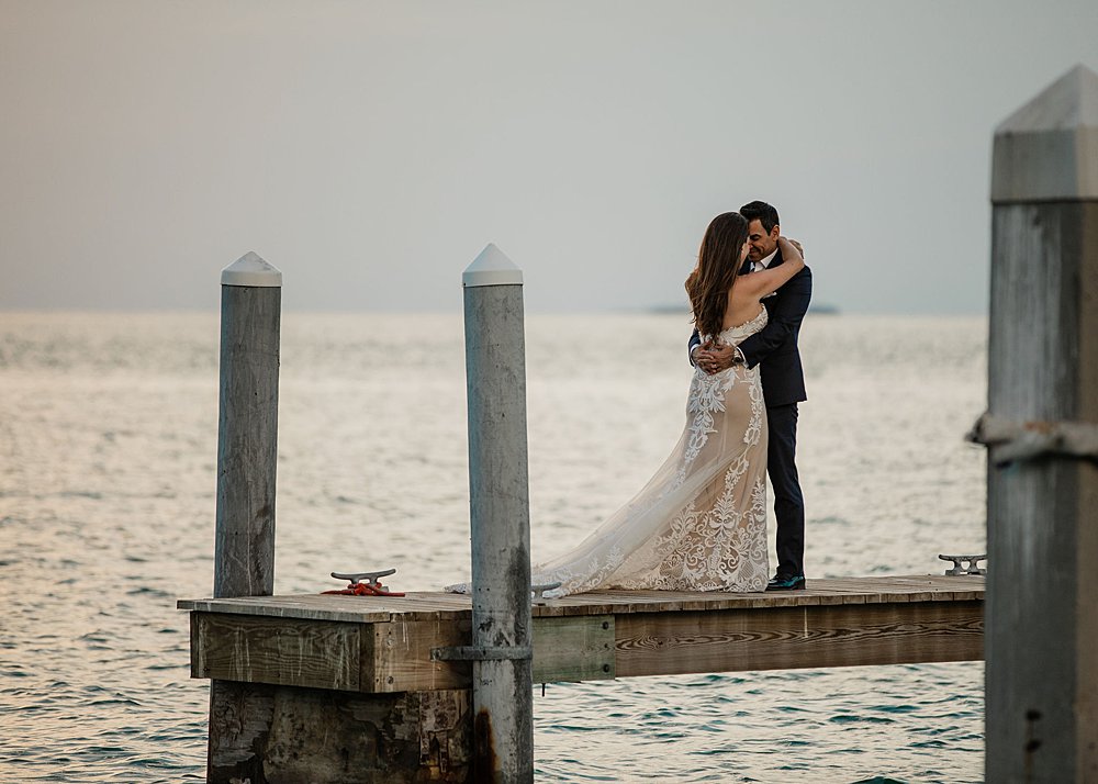 wedding couple hugging on a pier in the Florida Keys