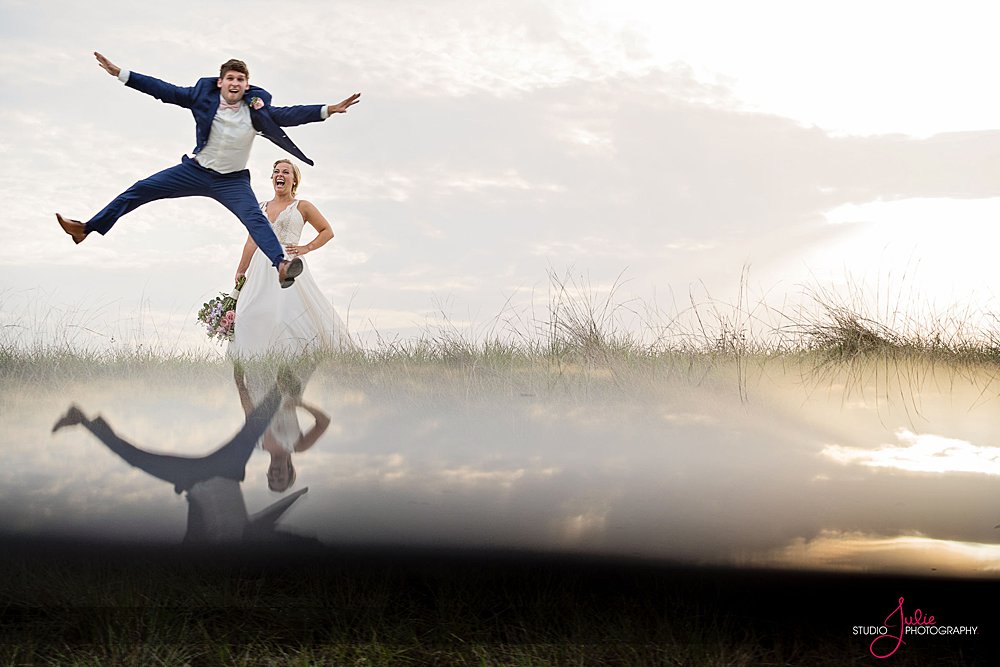 groom jumping in the air at a Florida Keys wedding